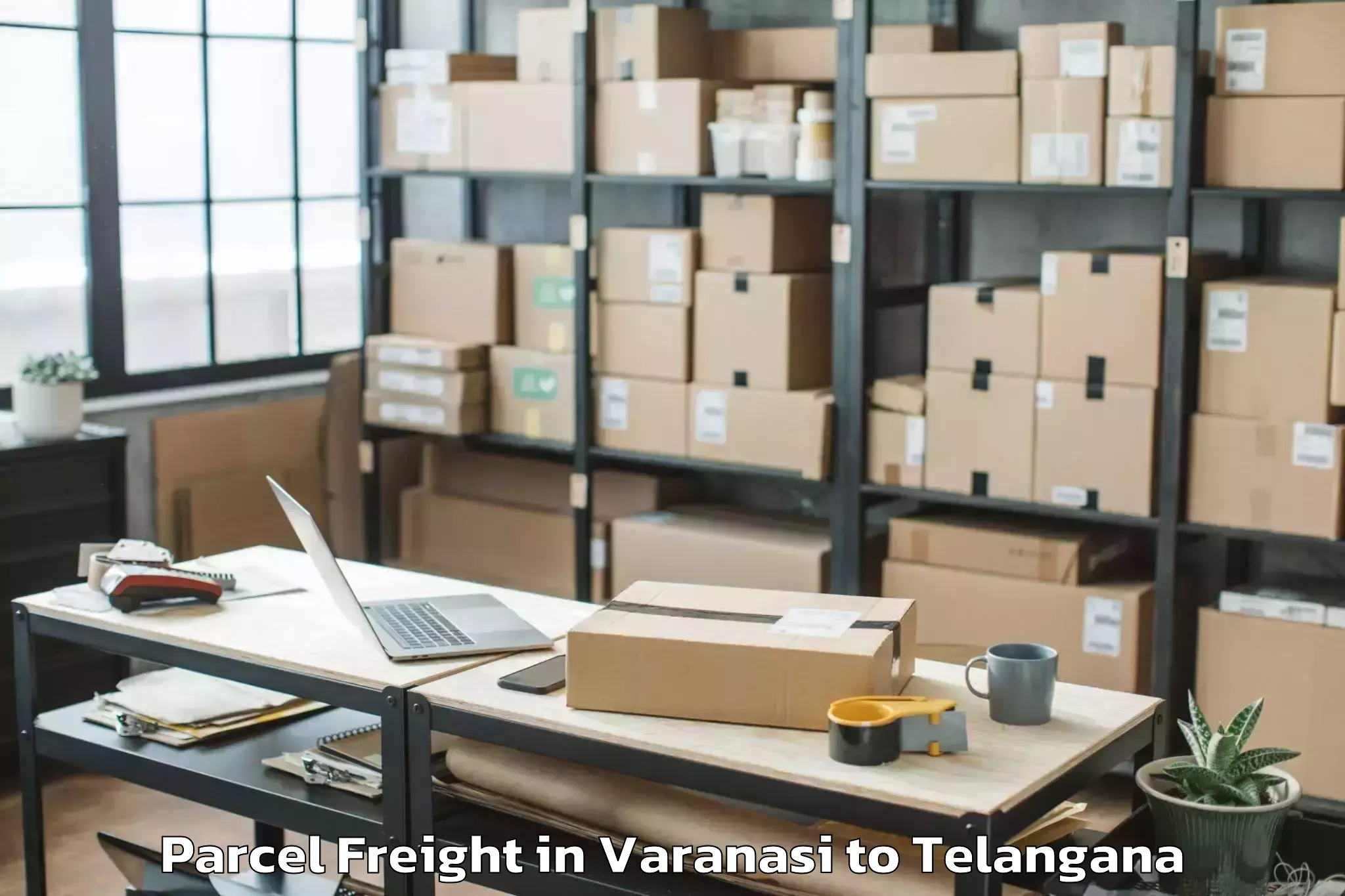 Book Varanasi to Utnoor Parcel Freight